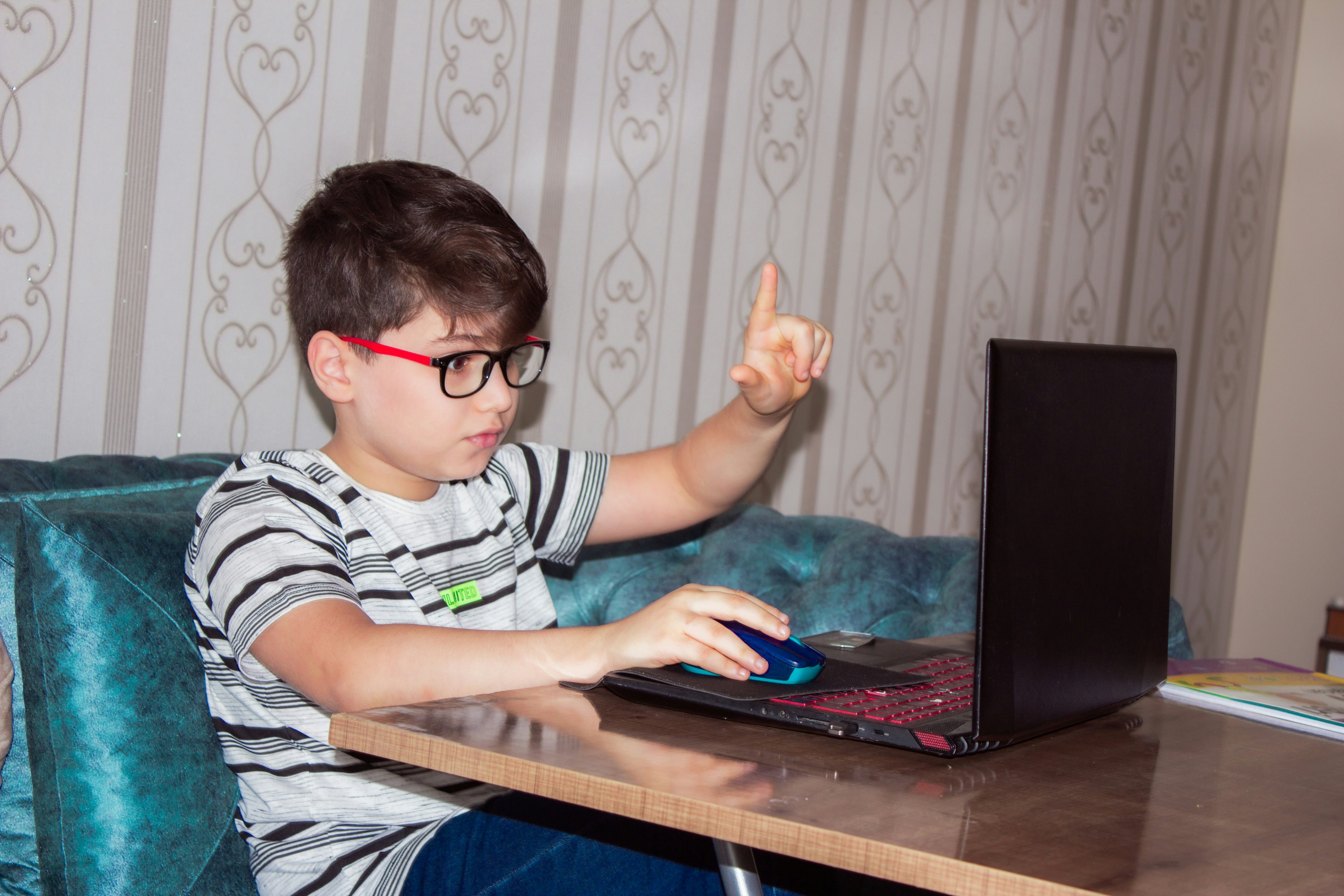A BOS student asking a question during a live online lesson